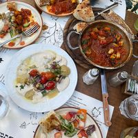 Delicious dips & fresh focaccia, super yummy hearty shakshuka & great desserts! All vegan😄 at Tmol Shilshom in Jerusalem