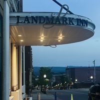 View from the street of the entrance  at Northland Gastropub at Landmark Inn in Marquette