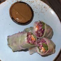 Fresh spring rolls - Two fresh flavour packed vegan spring rolls with tofu & peanut sauce dip  at Karma Kayak in 