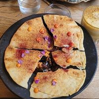 Aubergine tartaar en Golden milk at PuiCk in Breda