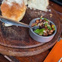 Complimentary bread and lentil dip at Pura Vida in El Calafate