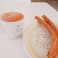 Chocolate caliente con agua y churros at Churrería El Moro - Roma in Mexico City