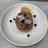 Coconut pancakes with berries  at Planta in Phnom Penh