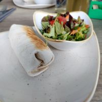 Vegan chili sin carne wrap (Beans, corn, vegetables, nachos, guacamole) with a green salad at Lagosol in Langschlag