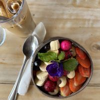 Dragon fruit smoothie bowl & iced latte (decoff)   at Good Stuff Cafe & Eco Store in Amed