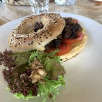 “healthy stuff” (mushrooms, hummus and tomato) on a sesame bagel   at Good Stuff Cafe & Eco Store in Amed