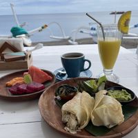 Breakfast burrito with juice, coffee, and fruit add-on  at SALT in Amed