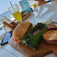 Pulled bbq jackfruit burger with sweet potato fries and vegan mayo. at SALT in Amed