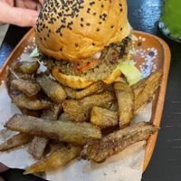 Lentil burger and fries   at Miss DELEITES in Cozumel