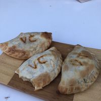 Empanadas veganas de cebolla y de tomate-mozzarella  at El Cafè De La Mirta in Barcelona