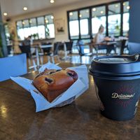 Vegan blueberry muffin and oat milk flat white at Elizabeth Town Bakery Cafe in Elizabeth Town