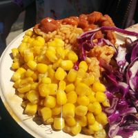 Bowl of corn, salad, chickn at Southern Fried Vegan BBQ in Los Angeles
