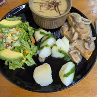 Meal of day: salad, potatoes, soup, garbanzo burger at Vegarden in Medellin
