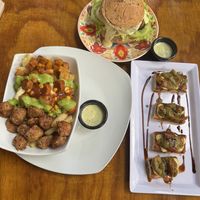 Portobello burger, bruschetta, and papas paisas  at Vegarden in Medellin