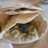 Sweet Manoushe (halawe, banana, blueberries & pistachio) at Five Grains in Bristol