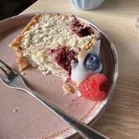 Raspberry and blueberry cake with icing  at Brew & Brownie in York