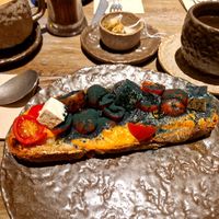 Spirulina tomato toast at Honest Greens - Gran Via in Madrid