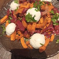 Sweet potatoes with alioli sauce at Honest Greens - Gran Via in Madrid