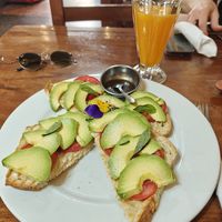 Toast with avocado, tomatos, basil and vinegar. Ask to be made without butter. at JC's Cafe in Cusco
