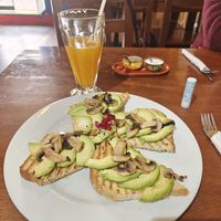 Avocado and garlic mushrooms on toast. Ask to be made without butter. at JC's Cafe in Cusco