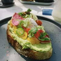 Super tasty avocado 🥑 toast, with self baked bread.   at Tinoc Café in Merida