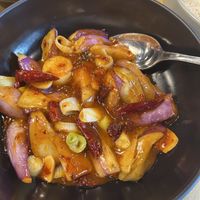 Kong Bao eggplant in a sweet and sour spicy sauce with cashew nuts and spring onions  at Le Nove Scodelle in Milan