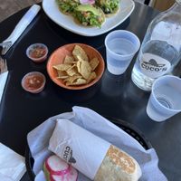 Super (vegan) burrito and vegan tacos. Medium is pretty spicy!  at Cuco's Burritos in Redwood City