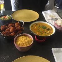 Bobo vegano with farofa de dendê, vinagrete e fried banana at Capim Dourado in Porto