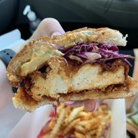 Hot chicken sandwich with peach and pine pop up  at Hot Chicken Mama in Blue Point