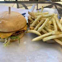 Samosa Burger with added cheese, and herbed fries  at Green Grill in Rancho Cordova