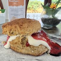 Scone with strawberry jam and vegan “cream” topping. 🍓  at The English Bakery Cafe in Gran Canaria