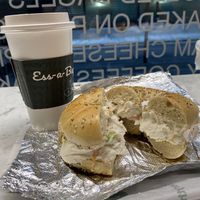 Everything bagel with veggie tofu schmear and oat chai lattee  at Ess a Bagel - W 32nd in New York City