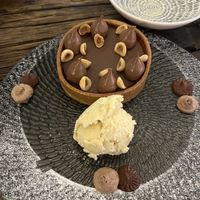Chocolate tart with vanilla ice cream  at People of Tomorrow in New Delhi