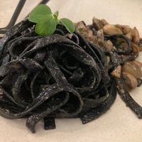 CHARCOAL FETTUCCINE
Black Ribbon Pasta, Portobello, Shiitake, Parsley, Confit Garlic, Wild Mushroom Dust at People of Tomorrow in New Delhi