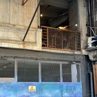View of a table from the outside   at Conflor Confeitaria Vegana in Rio De Janeiro