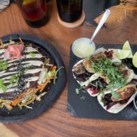 Okonomiyaki (left) and Jamaican tacos (right) 👌👌  at Agni Vital Kitchen in Bacalar