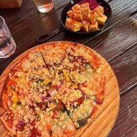 Vegetarian pizza with vegan cheese, crispy tofu entree  at The Blue Pub in Methven
