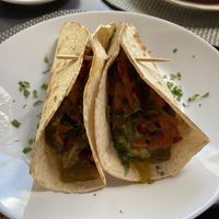 Less taco and more stuffed like a burrito. Filling and yummy!  at La Regina Restaurante in Madrid