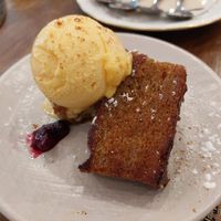 Dessert / Banana bread with tangerine ice cream   at La Regina Restaurante in Madrid