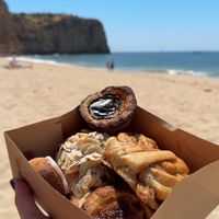Pastel de nata, almond croissant, lemon blueberry cookie, cinnamon knot   at All Things Dough in Lagos