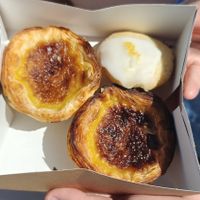 2  vegan pasteis de nata+ 1 bolinho de limão com mirtilos at All Things Dough in Lagos