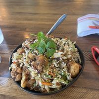 Tsos cauliflower without the mayo drizzle. Rice on bottom. Yum!  at Link & Pin in Charlotte