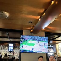 atmosphere with sport games on tv  at Yard House in Honolulu