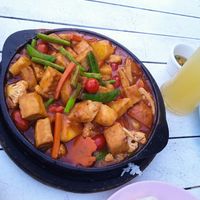 Pineapple tomatoes beans cauliflower and tofu in a really sweet red sauce at TUBTIM Restaurant in Koh Samet