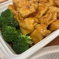 General Tso’s tofu with takeout container and styrofoam plate   at Ruby Cafe in Bethlehem