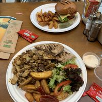 Vegan gyros and vegan chicken burger with vegan cheese and vegan bacon.   at Ubuntu Lounge Bar - Maybe closed in Skiathos