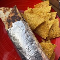 Vegan wrap and tortilla chips. The chef was very knowledgeable and helpful. There were quite a few options including a chilli and a burger. Wouk’s definitely recommend ☺️☺ at Flo's in Tenerife