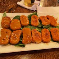Vegan nuggets with buffalo and gold sauces  at Pizzetta in Mystic
