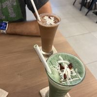 Protein Shake (green) and antioxidant Shake (with cacao)  at Moringa Plant-Based Restaurant in Kuta