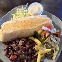 Vegan burrito with side beans, veg and soy sour creme.  6/10  at Miguel's Mexican Restaurant in Bangor